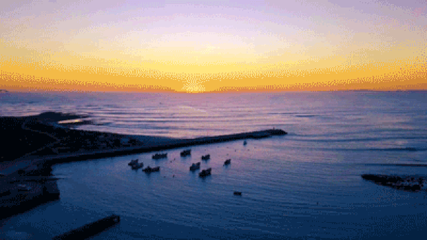唯美海平面夕阳海岸码头航拍